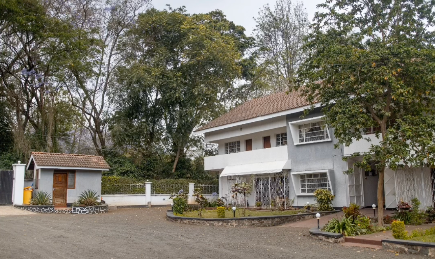 VIT Arusha House — a white two-storey volunteer house in the centre of Arusha